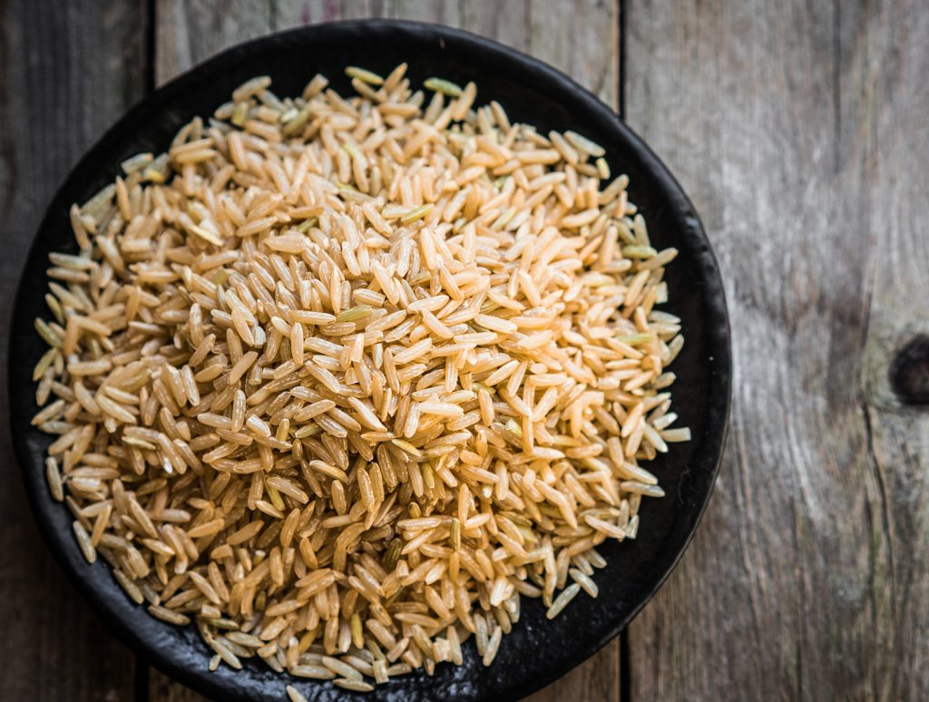 Dried brown rice in bowl