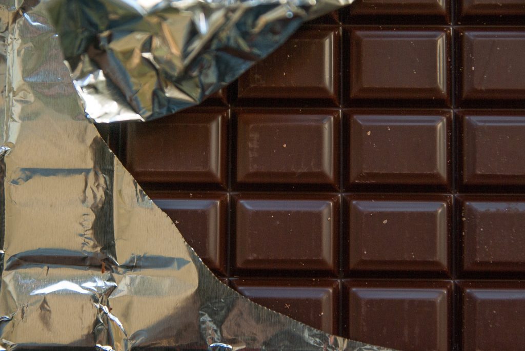 Chocolate bar with wrapper take off