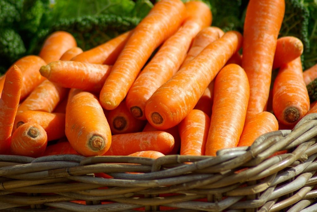 Fresh carrots in a basket.