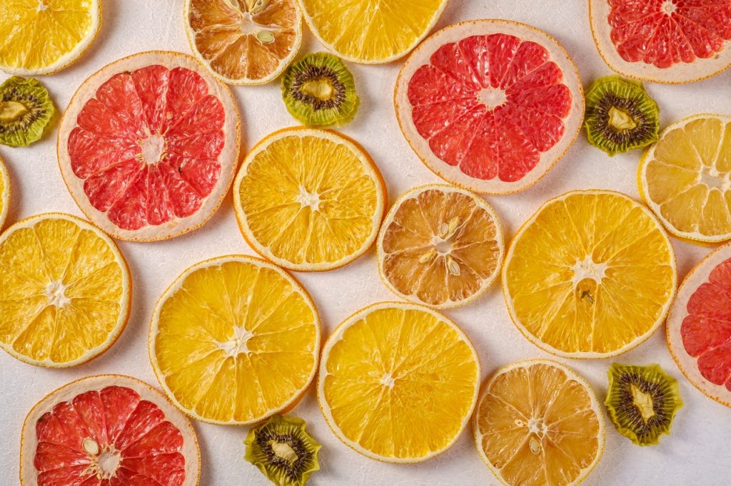 Thin slices of dehydrated citrus fruits, including grapefruits, oranges, clementines and kiwis.